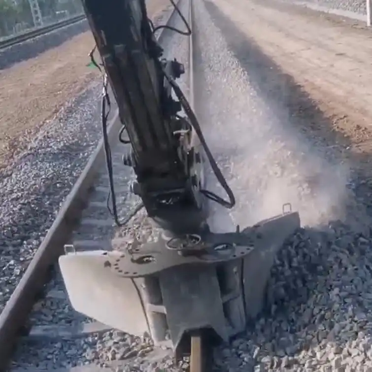 How does the 360° rotation angle enhance the performance of the railway excavator ballast plow?